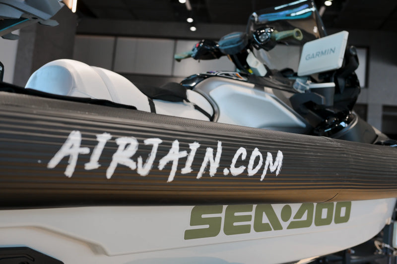 Close-up view of AirJain collar logo on Sea-Doo jet ski, highlighting the brand’s impact protection design and logo on the collar, providing durability and safety for water activities