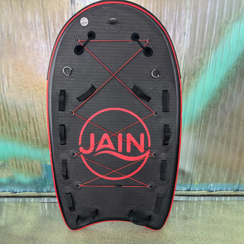 Airjain Pro inflatable water rescue board with red bungee cords and reinforced safety handles.